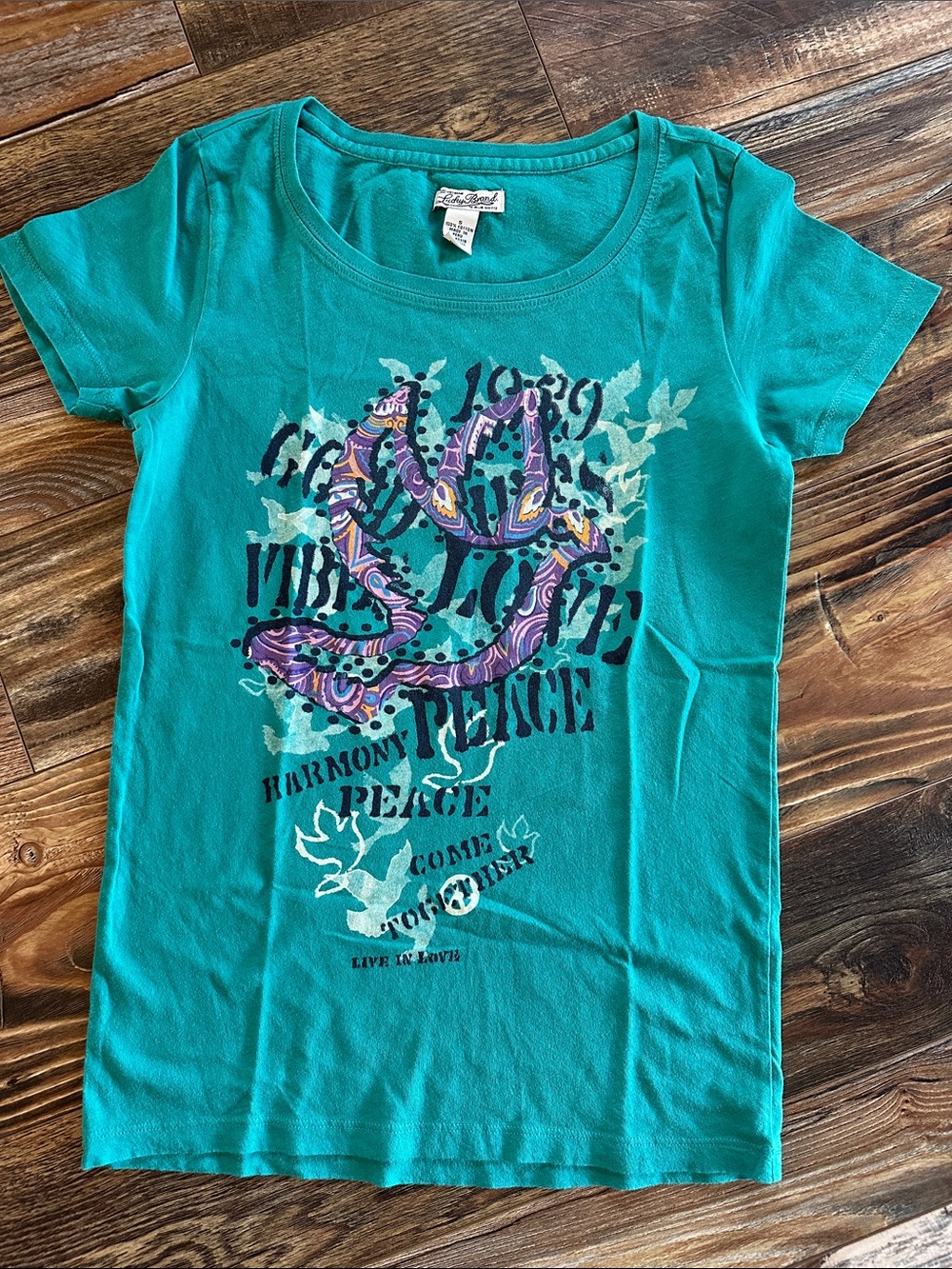 Lucky Brand Teal Short Sleeve Graphic Tee with Purple Accent